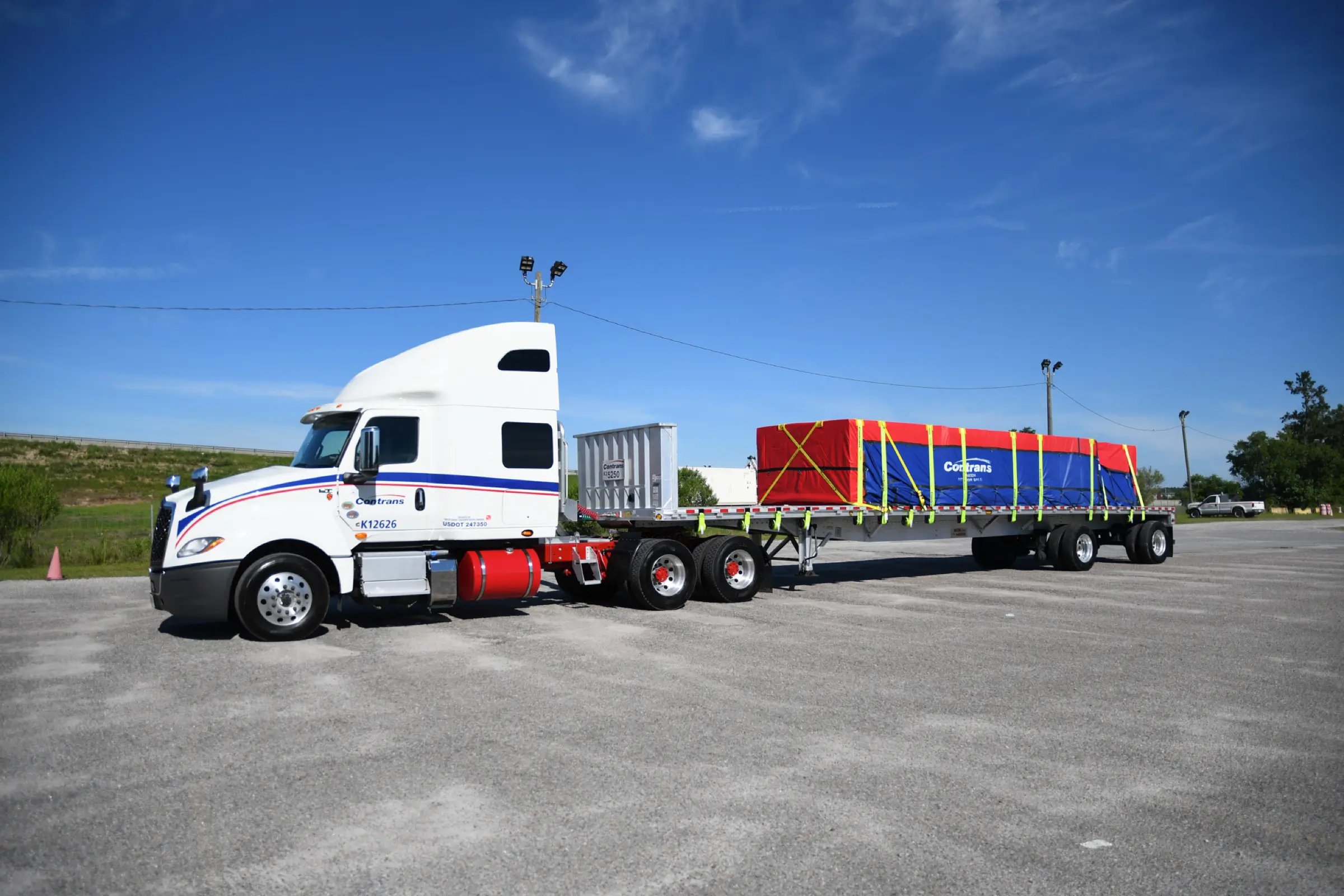 SFI International truck transporting oversized machinery