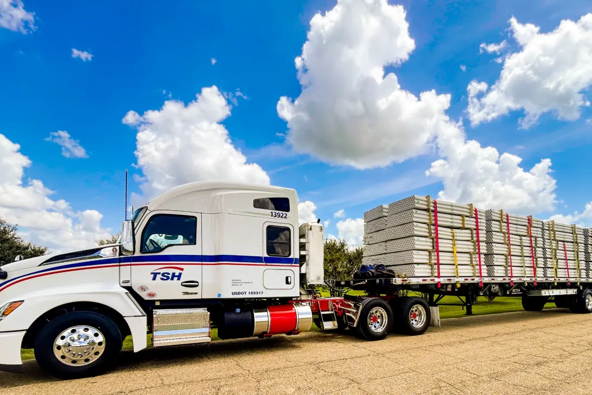 SFI truck on route moving flatbed transportation